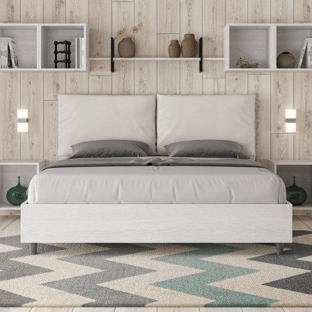Letto moderno matrimoniale con testiera  rivestita in ecopelle bianca