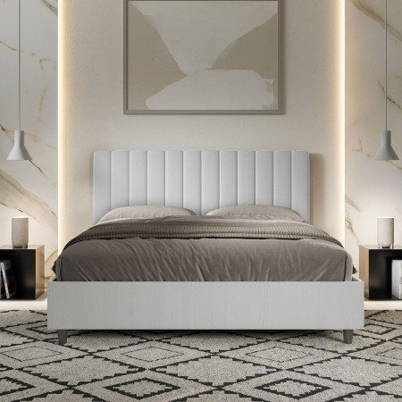 Letto moderno matrimoniale con testiera e giroletto imbottito in ecopelle bianca